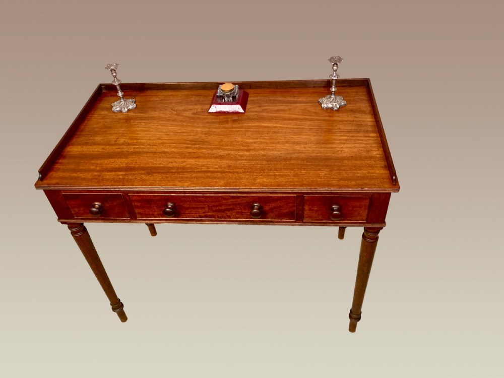 Georgian mahogany writing table. 
 View V