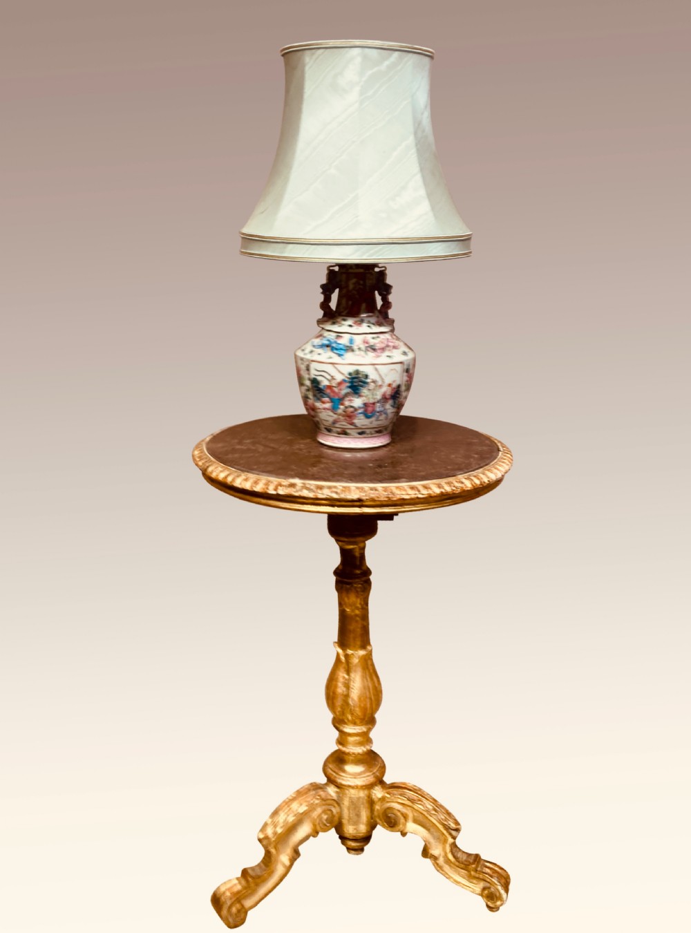 Circular carved giltwood lamp table with marble top. View III