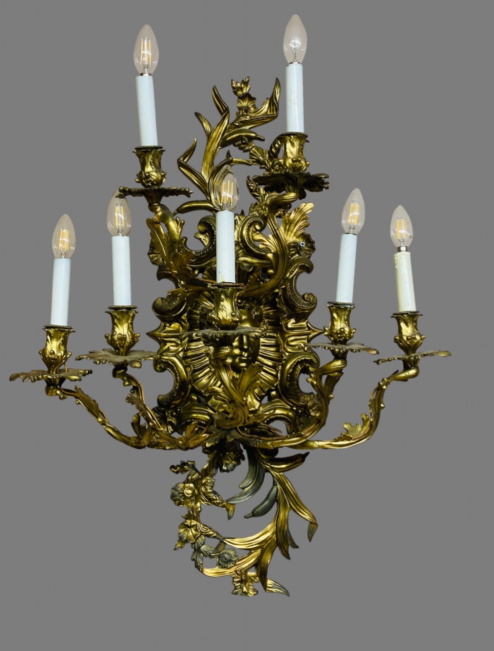 Large 7 branch gilded wall light.