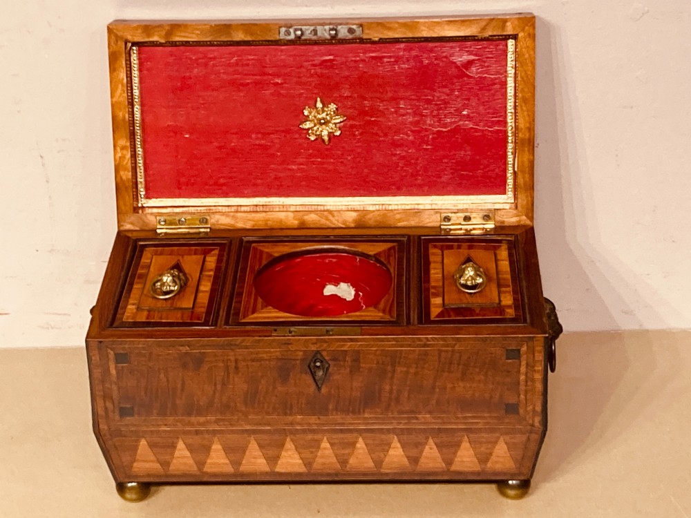 Regency inlaid mahogany tea caddy.