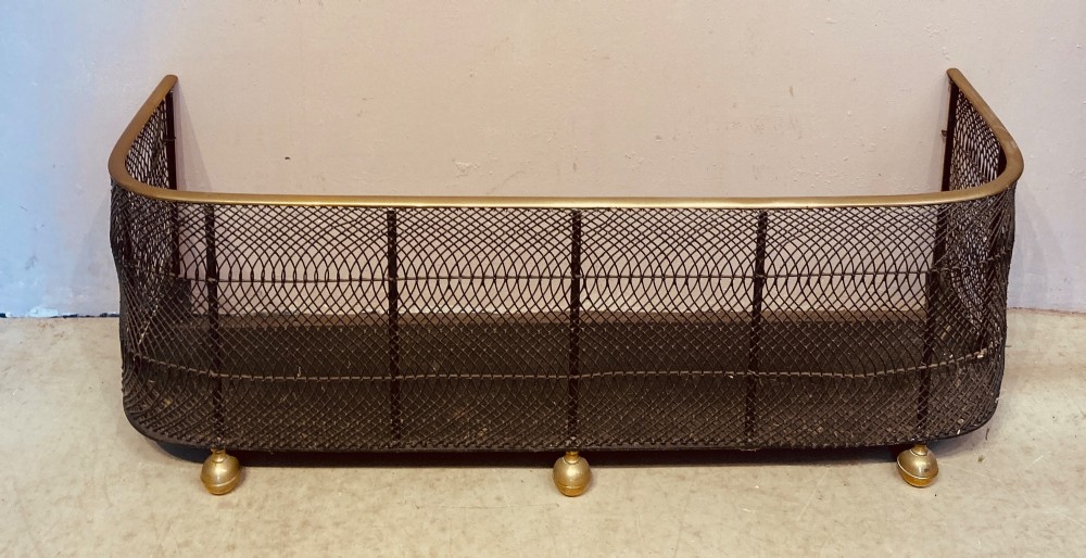 Georgian brass and wire fender.