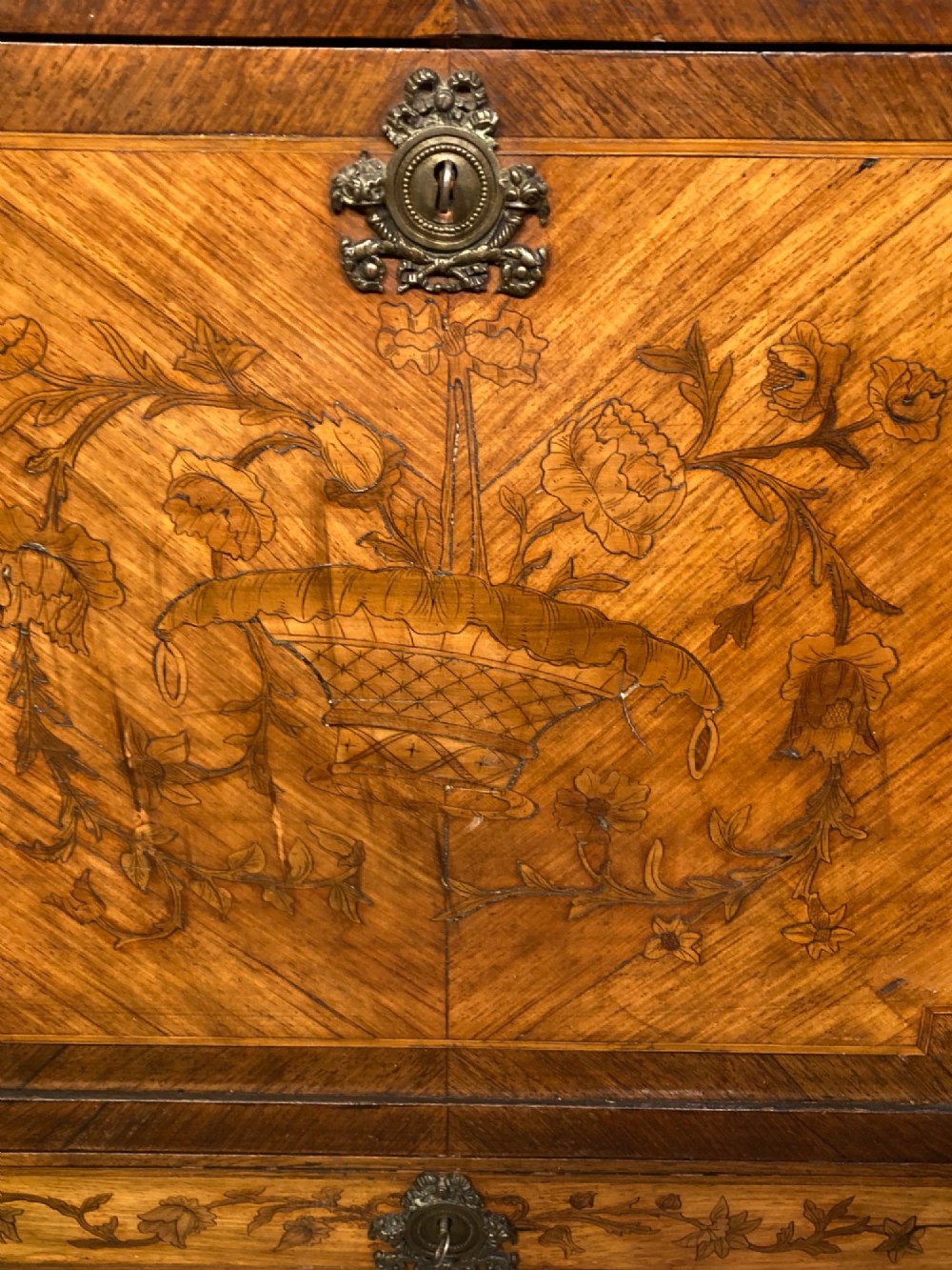 A French Louis XV style kingwood escritoire featuring floral marquetry inlay, slender cabriole legs, a brass top gallery, and gilt-bronze mounts. View V