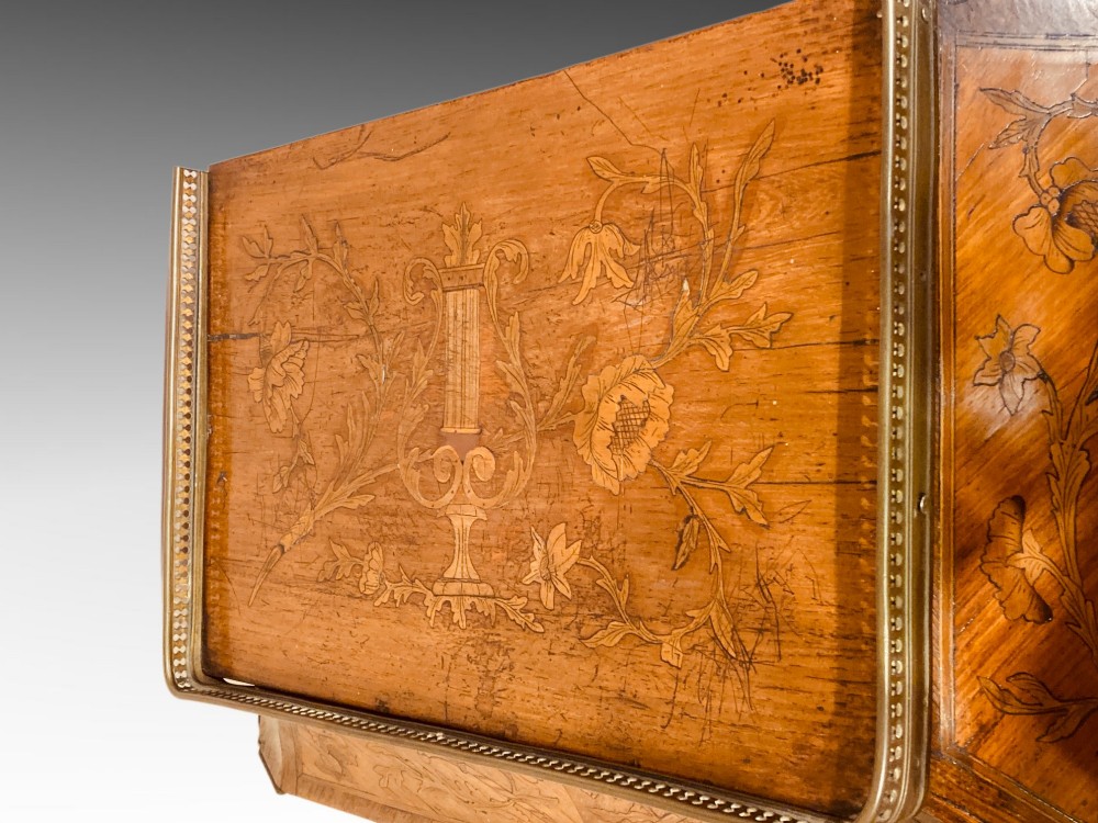 A French Louis XV style kingwood escritoire featuring floral marquetry inlay, slender cabriole legs, a brass top gallery, and gilt-bronze mounts. View VII