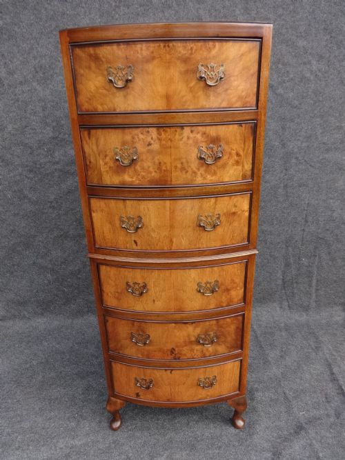 Tall Bowed Walnut Chest