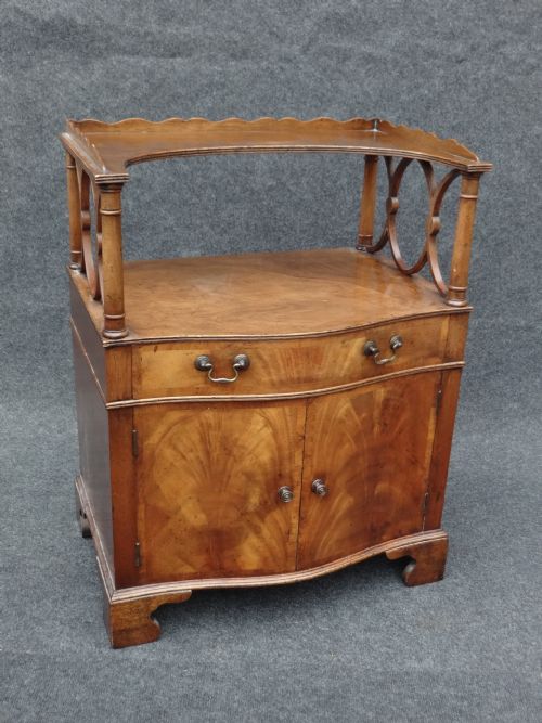 Pretty Serpentine Walnut Cabinet