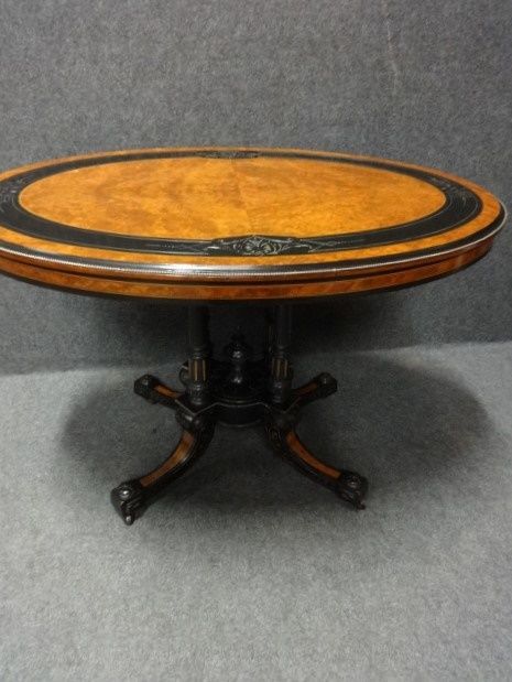 Fine Ebony and Amboyna Center Table