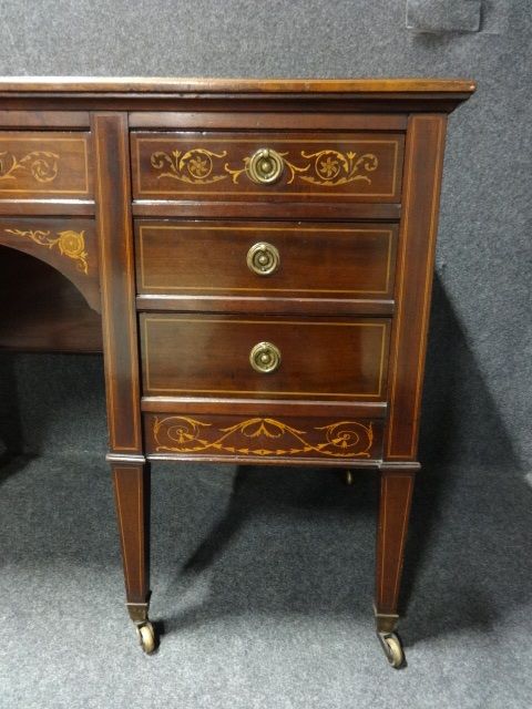 fig 1. Inlaid Mahogany seven drawer Desk