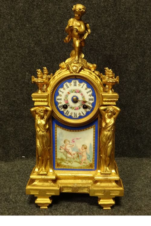 Outstanding Gilt Bronze Clock with Sevres Panels "P. Famourey"