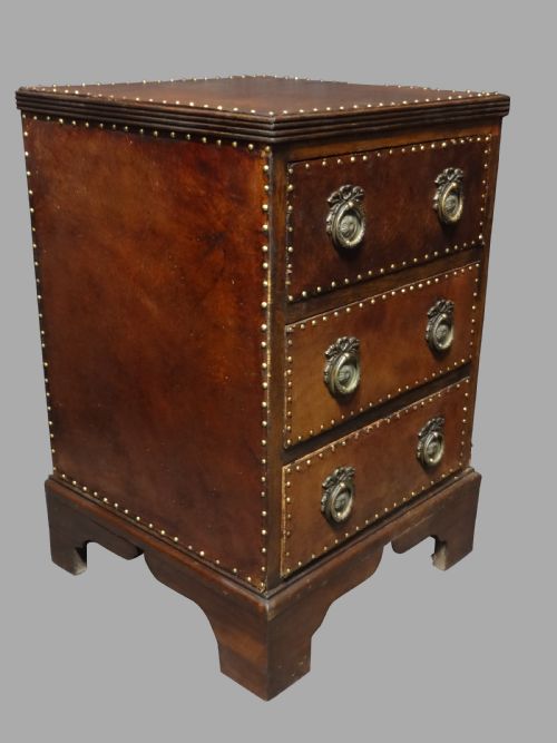 Small Leather Covered Three Drawer Chest of Drawers