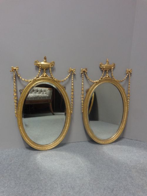 Pair English Regency Oval Gilt Mirrors