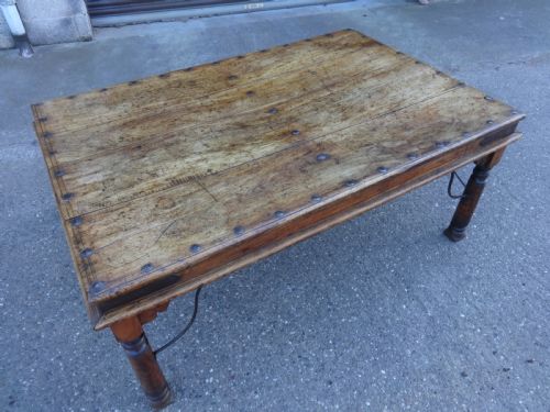 A Superb Iron and Teak  Dining Table