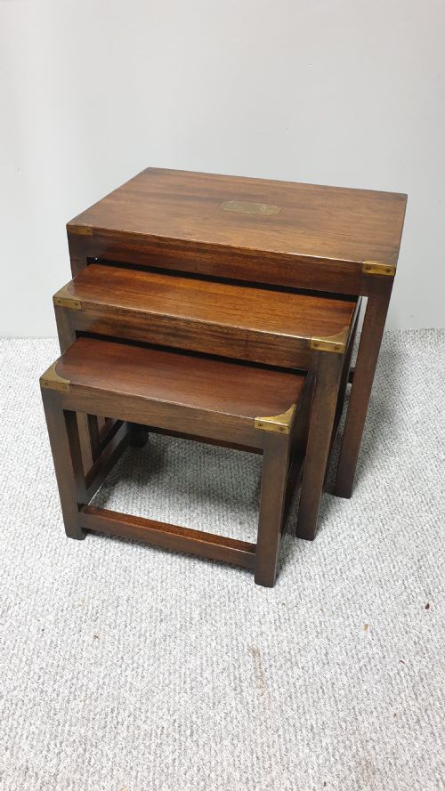 A Mahogany Campaign Nest of Three Tables