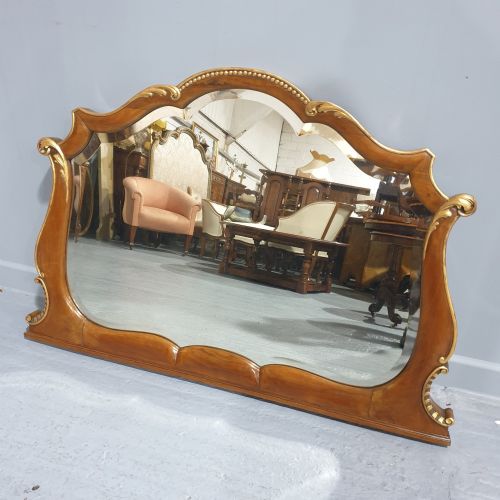 WALNUT AND PARCEL GILT OVERMANTLE MIRROR