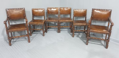 fig 1. Seat Six Oak and Hide Covered Dining Chairs