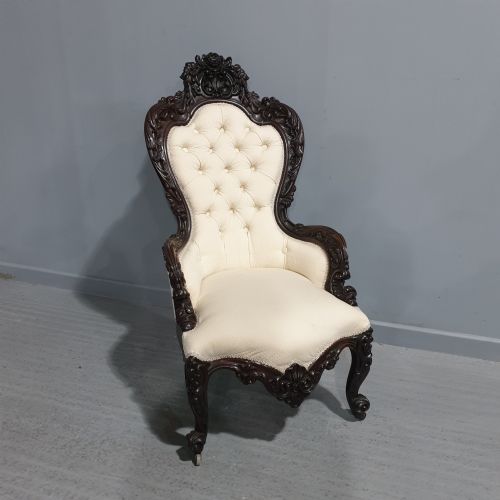 MAGNIFICENT CARVED MAHOGANY ARMCHAIR