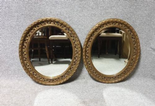 Excellent Pair of Gilt Oval Mirrors