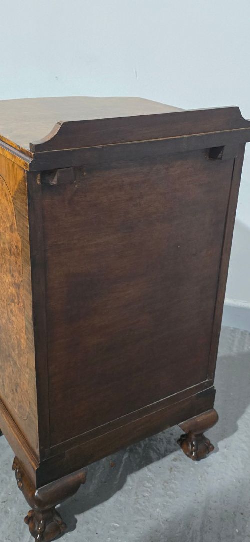 A small burr walnut side cabinet with a single upper drawer over a cupboard door, raised on carved cabriole legs with claw-and-ball feet. View VIII