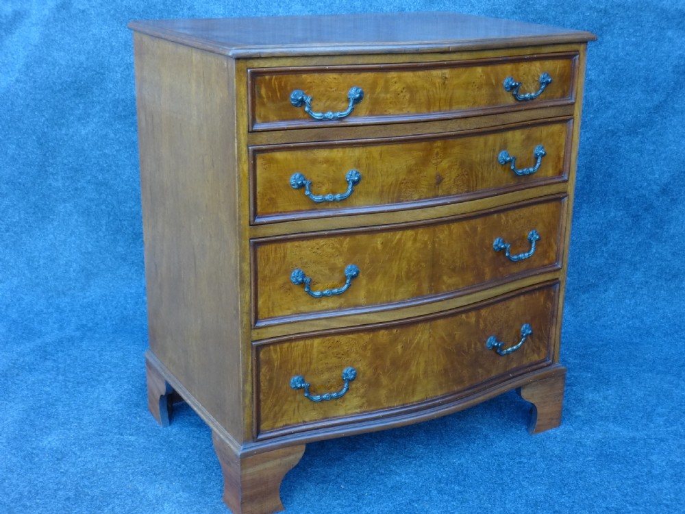 Pretty 1920's Walnut Serpentine Chest