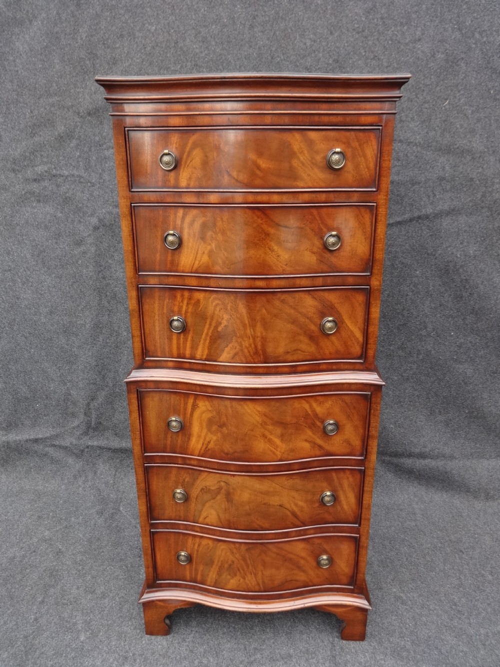Small Serpentine Mahogany Chest on Chest