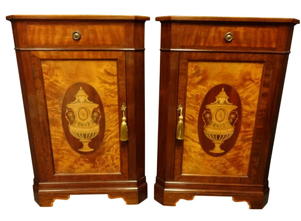 A very good Pair of Inlaid Corner Cupboards