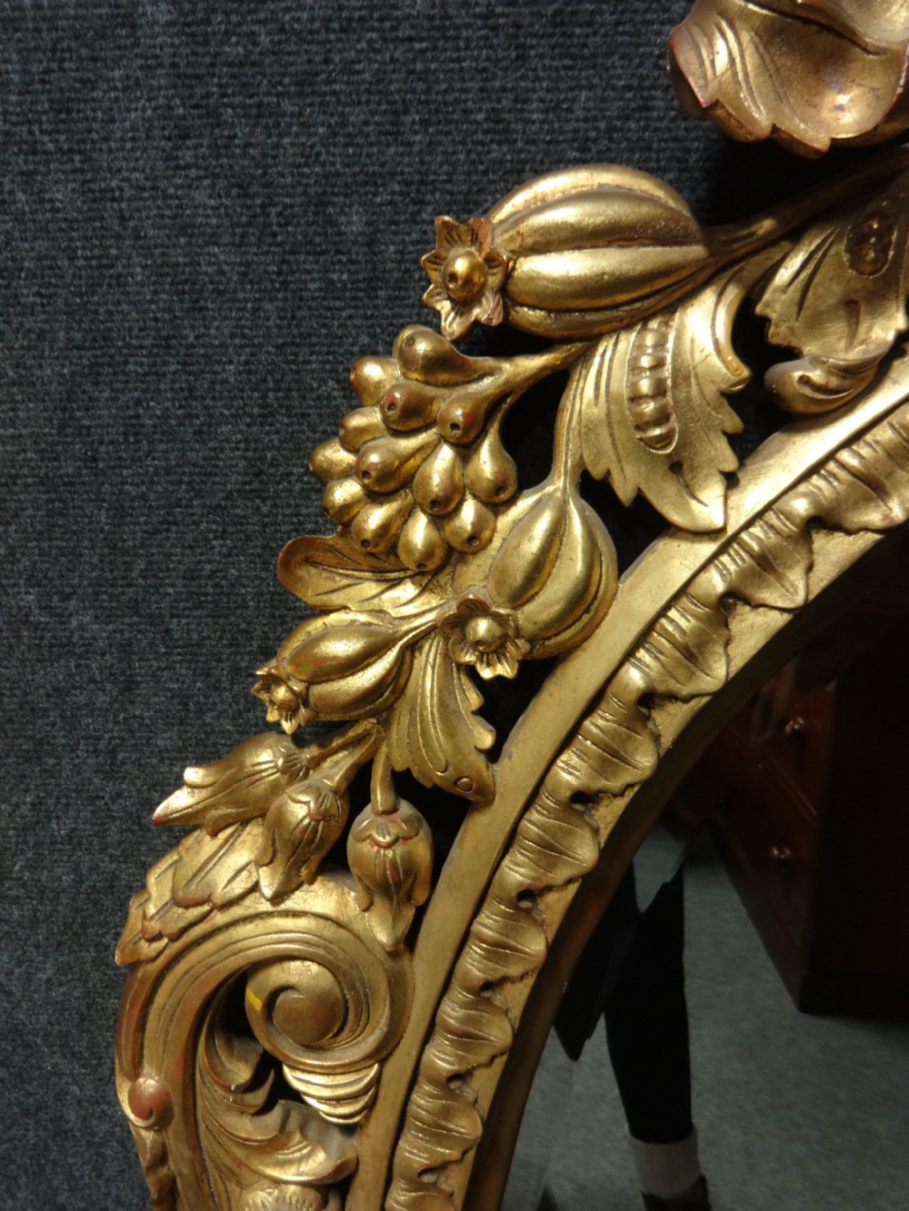 Fine and Large Carved Oval Giltwood Mirror View III