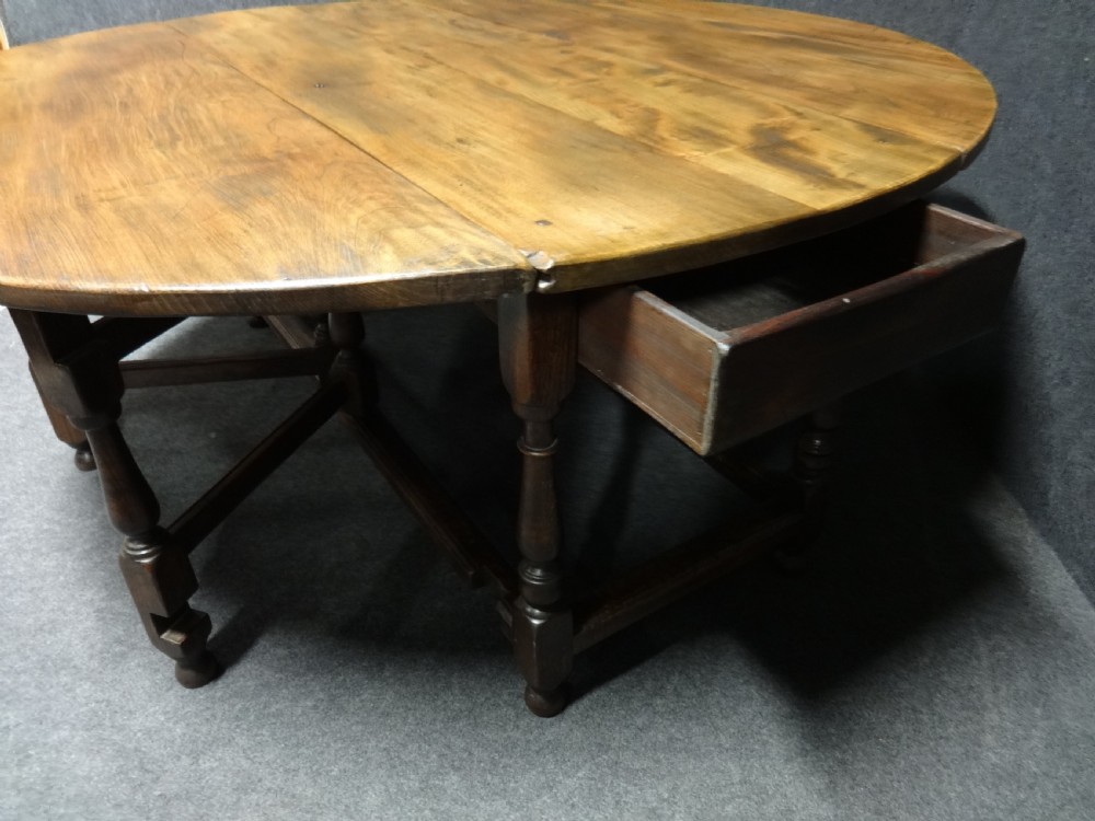 A Superb Huge Elm Drop Leaf Double Gate Dining Table View IV