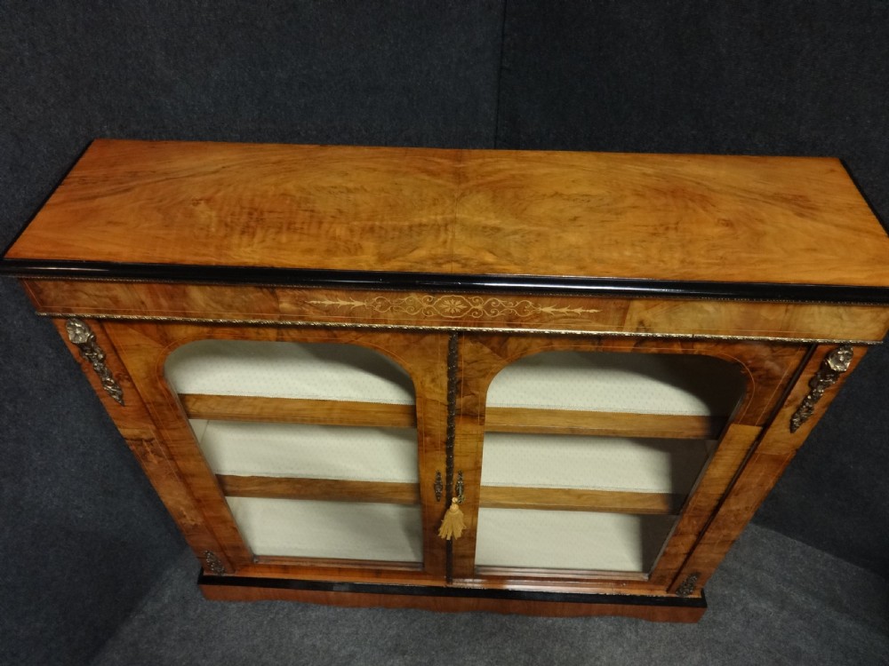 A Good Victorian Inlaid Walnut Two Door Pier Bookcase View V