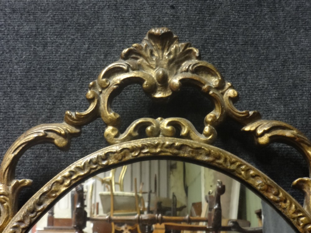 Good Pair Gilt Oval Wall Mirrors View III