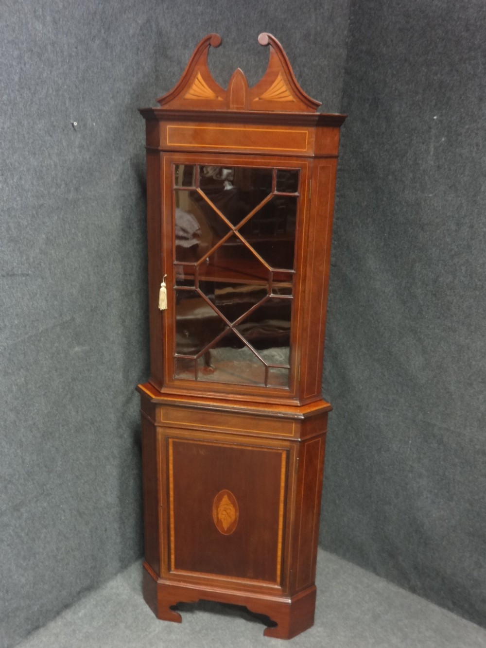 A Very Good Quality Inlaid Mahogany Corner Cabinet View II