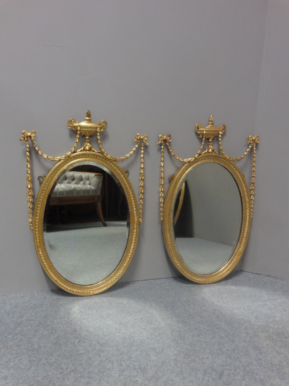 Pair English Regency Oval Gilt Mirrors