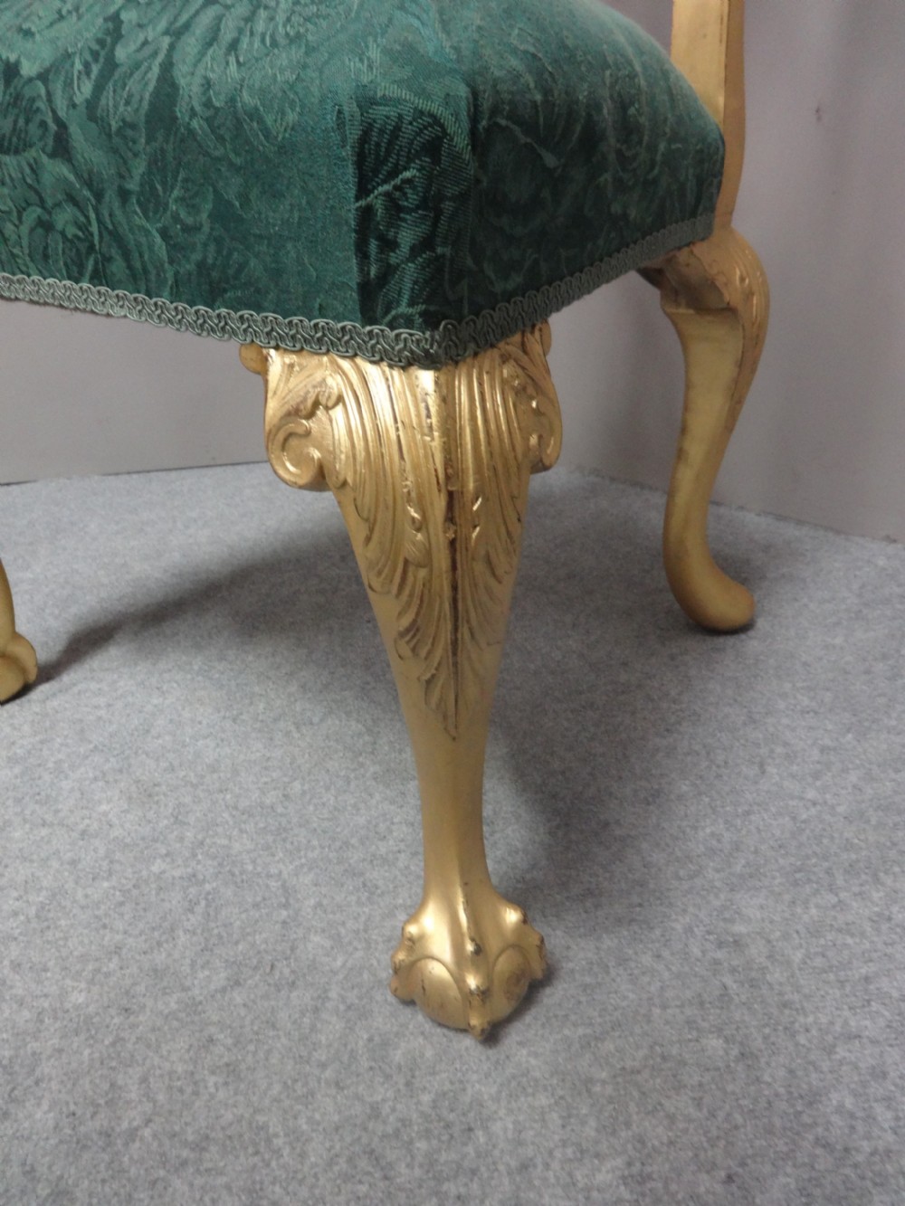 A Georgian giltwood side chair featuring carved cabriole legs with claw and ball feet, an ornate pierced splat back, and green patterned upholstery. View IV