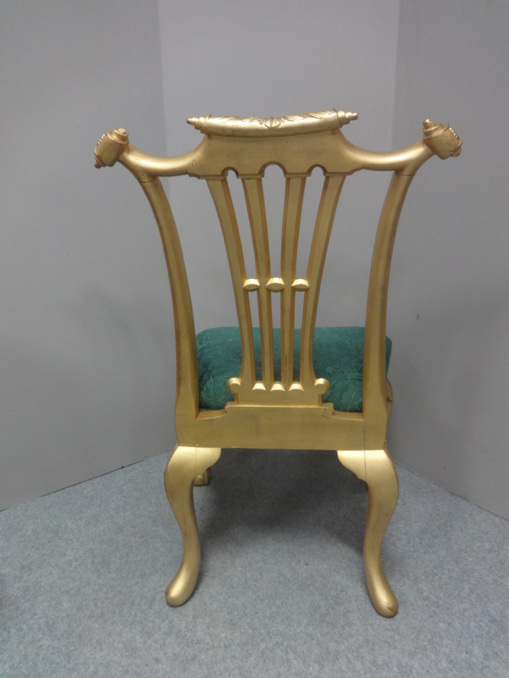 A Georgian giltwood side chair featuring carved cabriole legs with claw and ball feet, an ornate pierced splat back, and green patterned upholstery. View VII