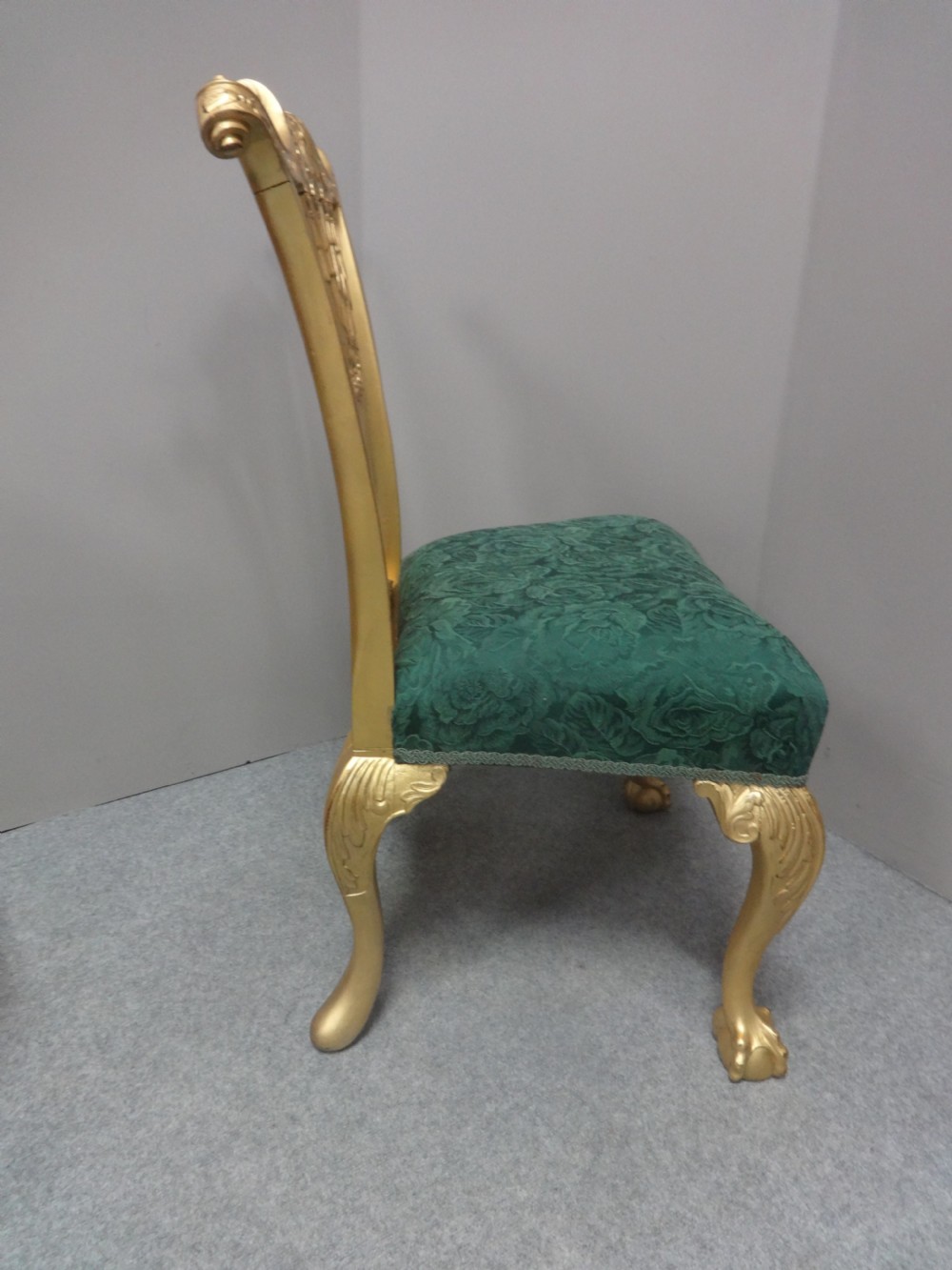 A Georgian giltwood side chair featuring carved cabriole legs with claw and ball feet, an ornate pierced splat back, and green patterned upholstery. View VIII