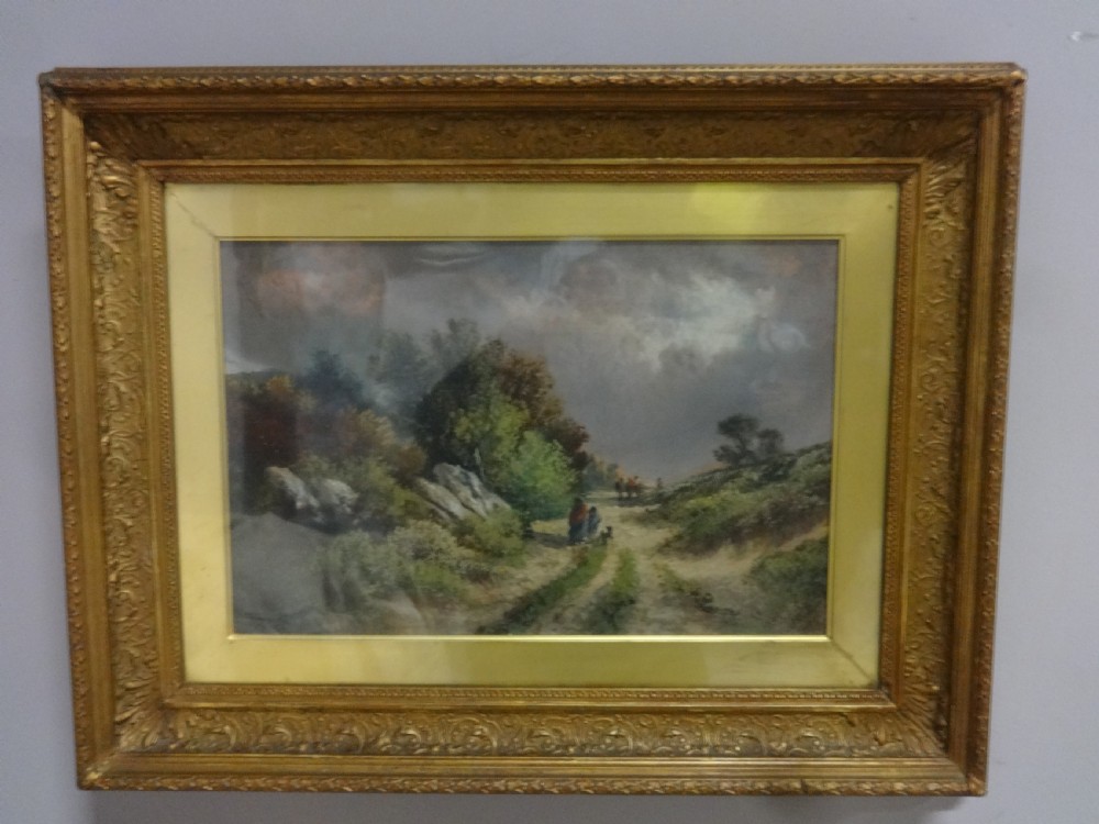 A Victorian landscape oil painting depicting figures on a dirt path through a rural countryside scene, framed in an ornate gilded frame.