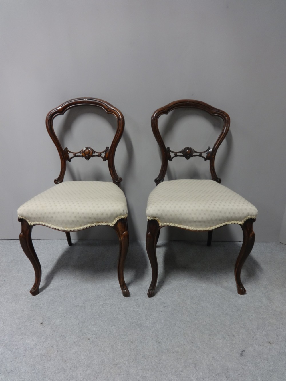 A Pair of Victorian Walnut Hall Chairs