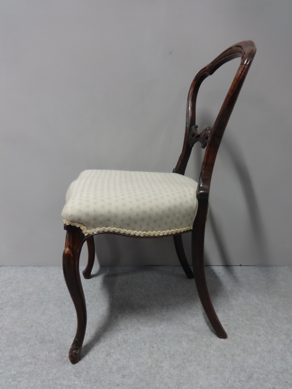A Pair of Victorian Walnut Hall Chairs View V