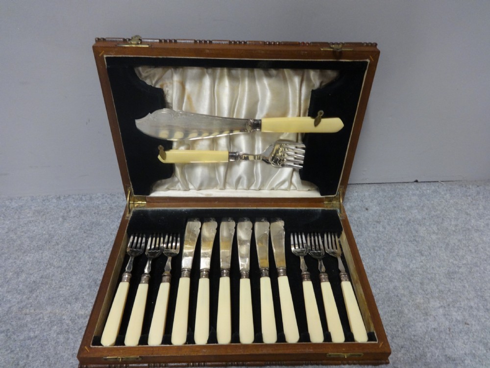 Boxed Set of Silver Collar Fish Knives and Forks View II