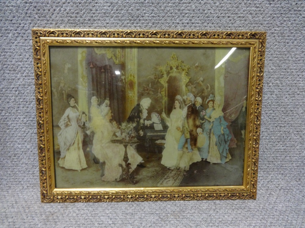 An antique French crystoleum depicting an 18th-century court gathering, housed in an ornate carved gilt frame.