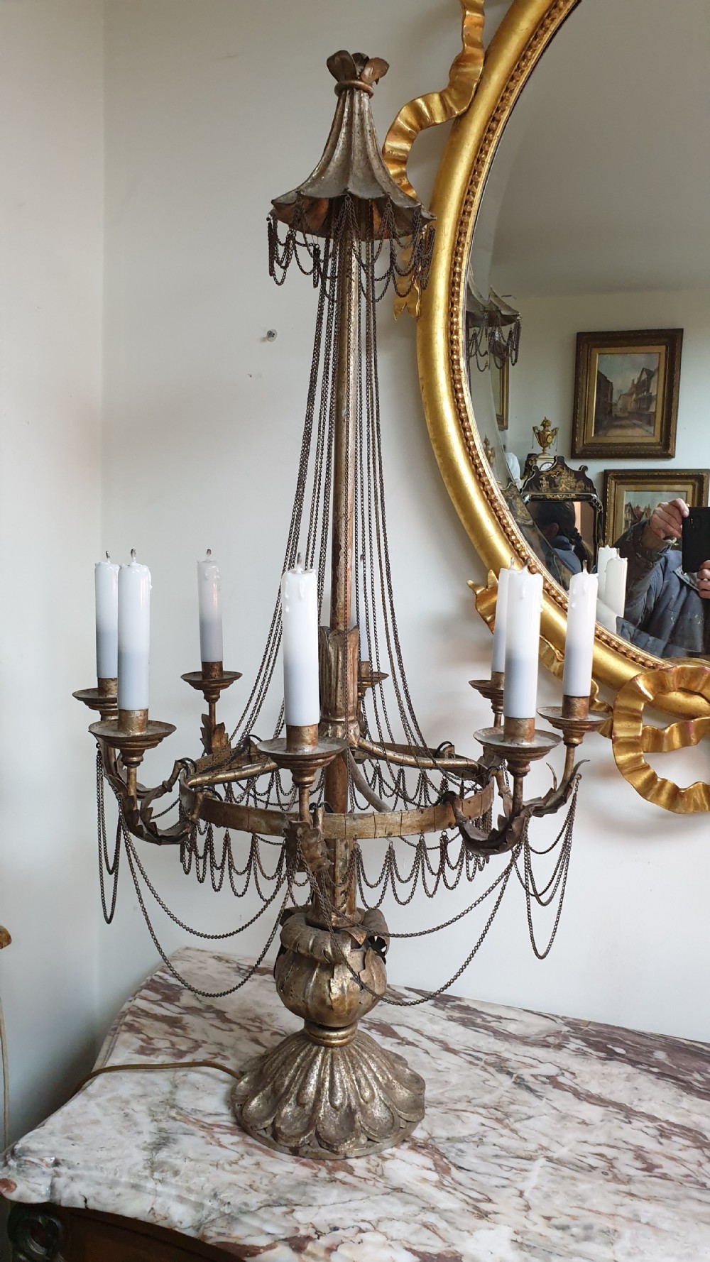 A pair of tall giltwood and metal eight-branch French candelabra table lamps featuring hanging wire swags and a tented canopy top. View III