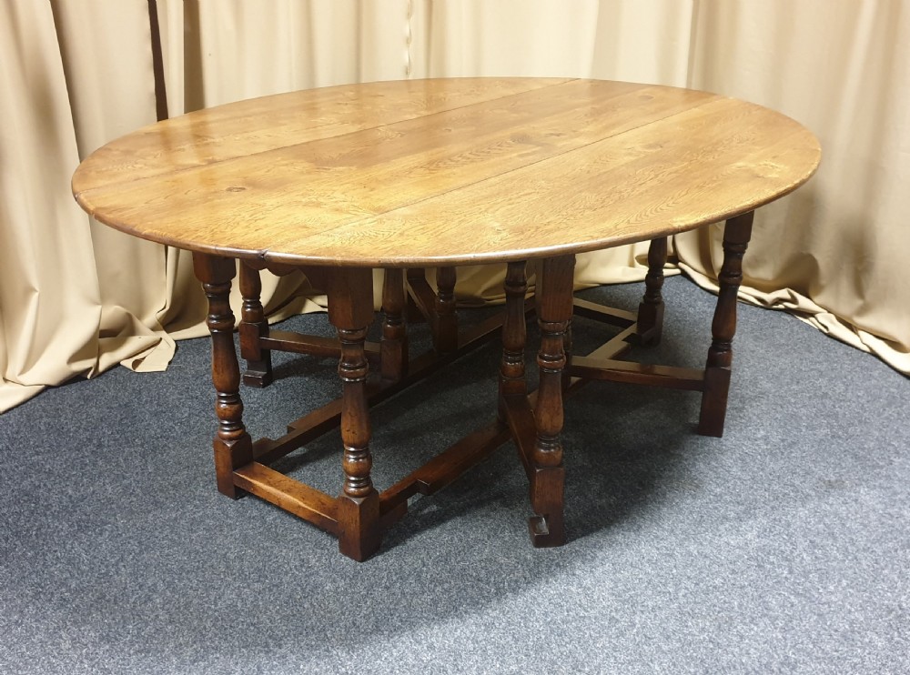 Superb 10/12 seat Oak Drop Leaf Wake table