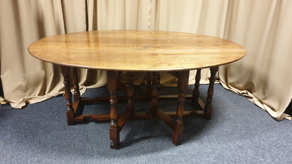 Superb 10/12 seat Oak Drop Leaf Wake table View IV