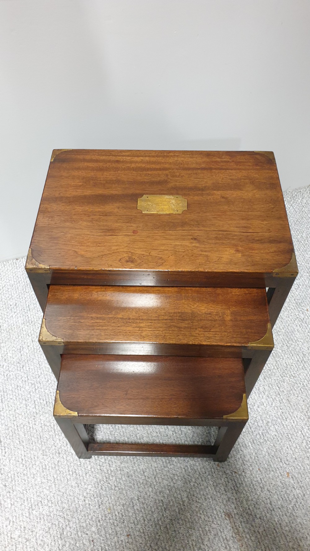 A Mahogany Campaign Nest of Three Tables View II