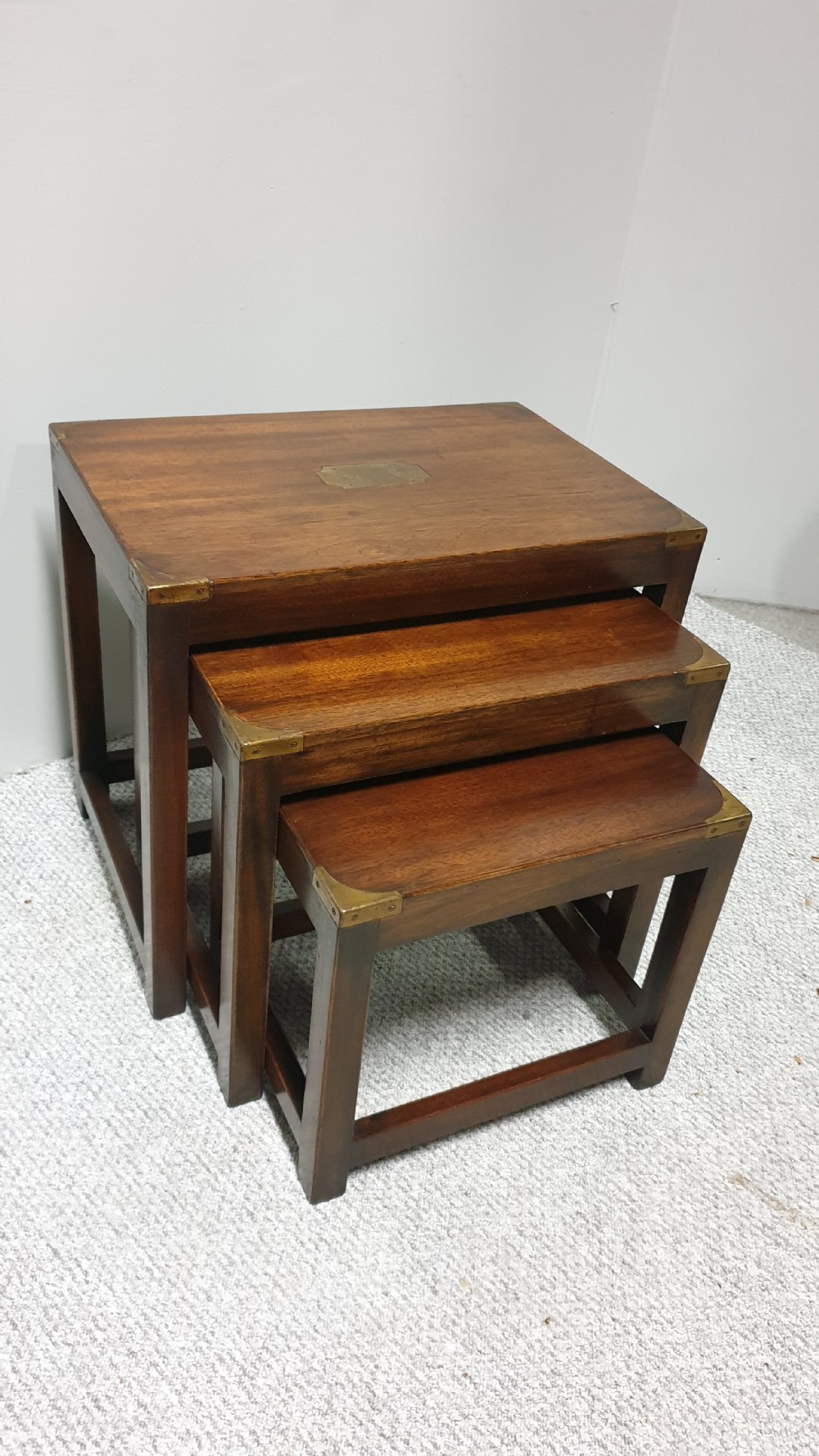 A Mahogany Campaign Nest of Three Tables View III