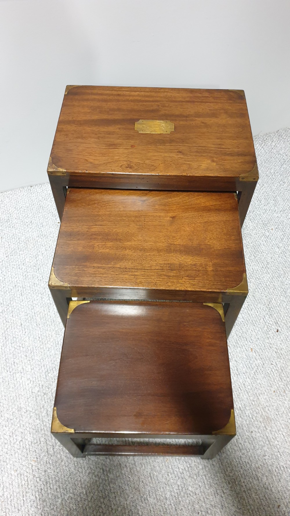 A Mahogany Campaign Nest of Three Tables View IV