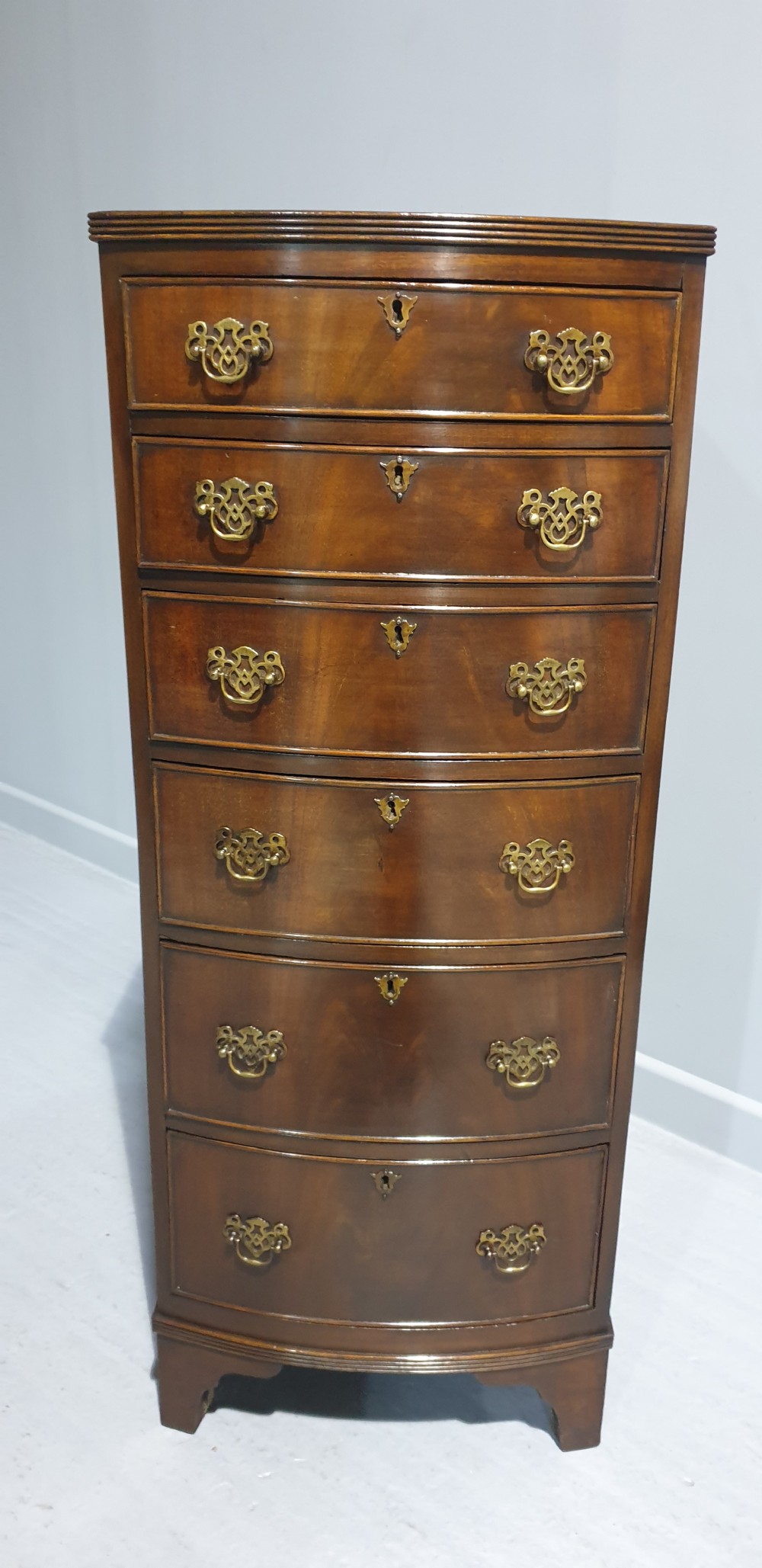 Tall Mahogany Bowed Chest of Drawers View VI
