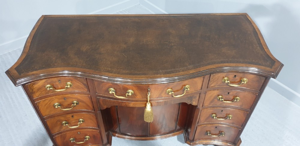 Outstanding Serpentine Mahogany Desk View XI