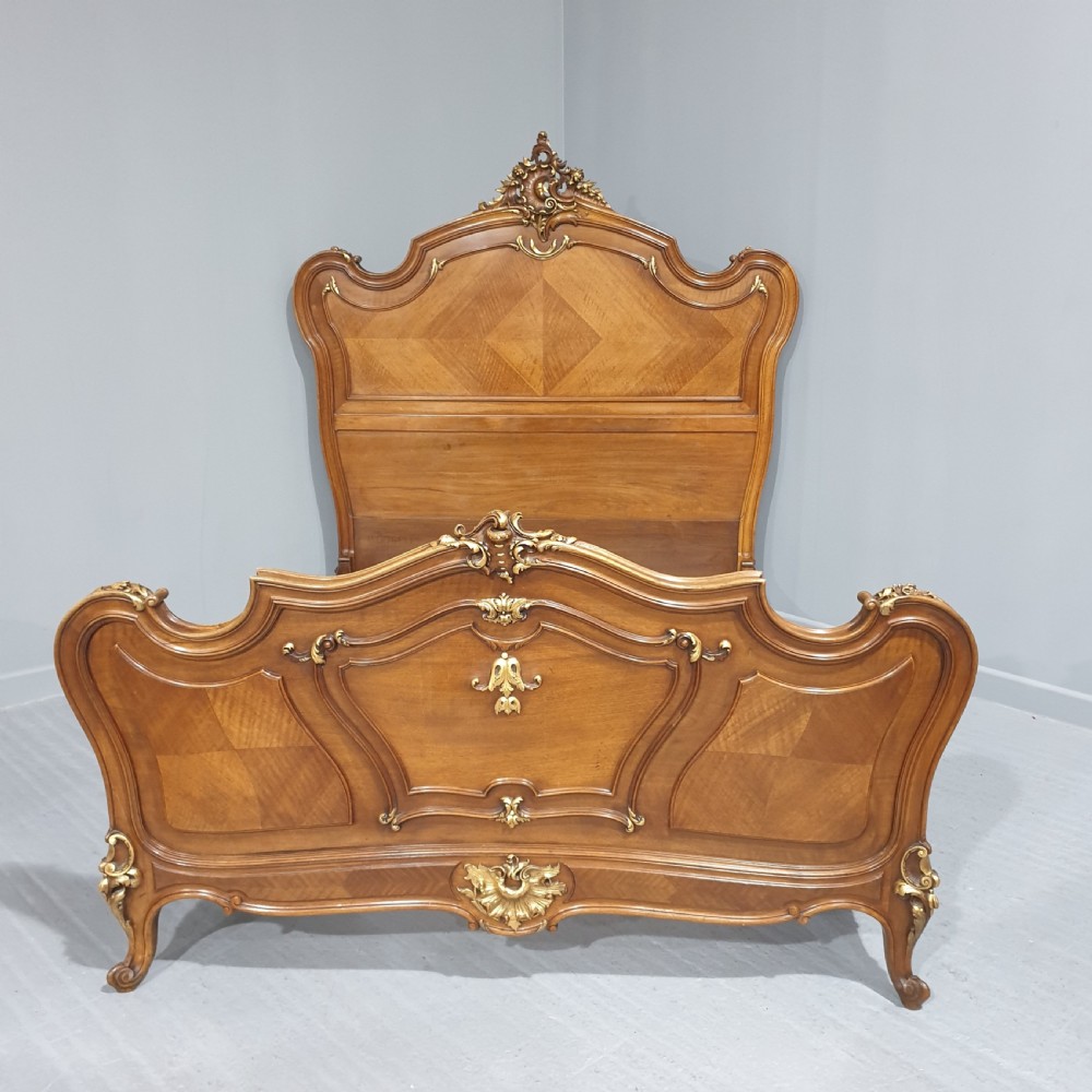 French Walnut and Parcel Gilt Bed