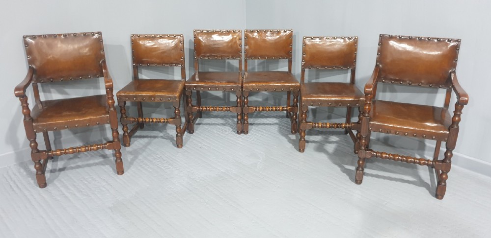 Seat Six Oak and Hide Covered Dining Chairs View II
