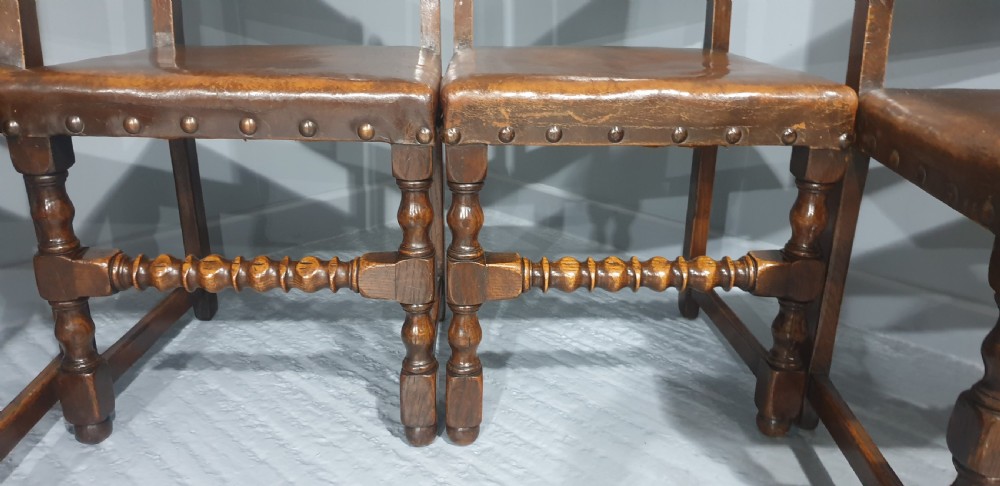 Seat Six Oak and Hide Covered Dining Chairs View IX