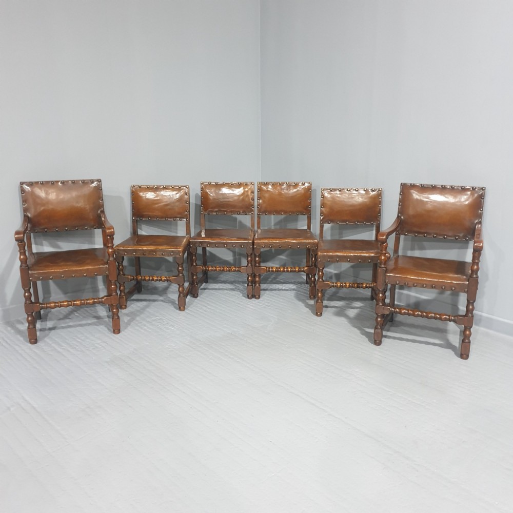 Seat Six Oak and Hide Covered Dining Chairs